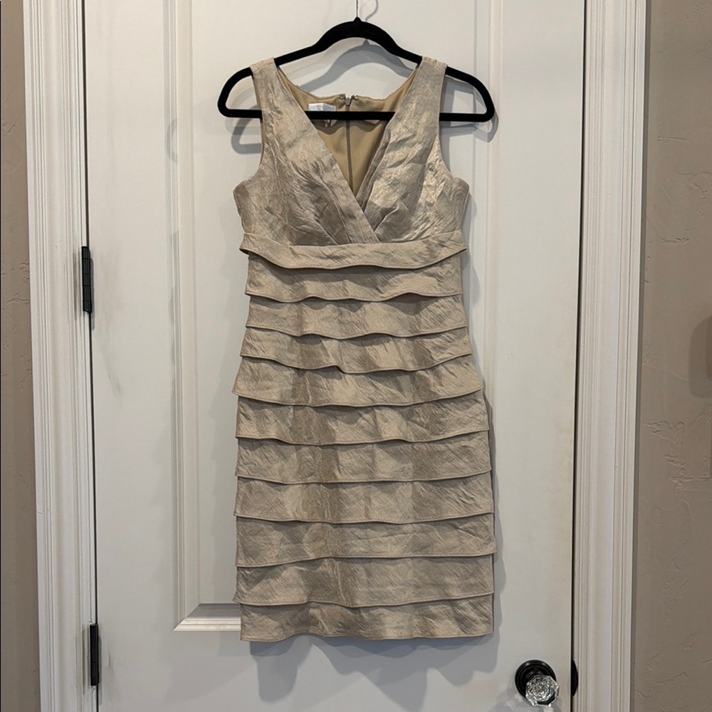 Elegant gold/ beige/tan/ Sleeveless ruffle Dress size 6